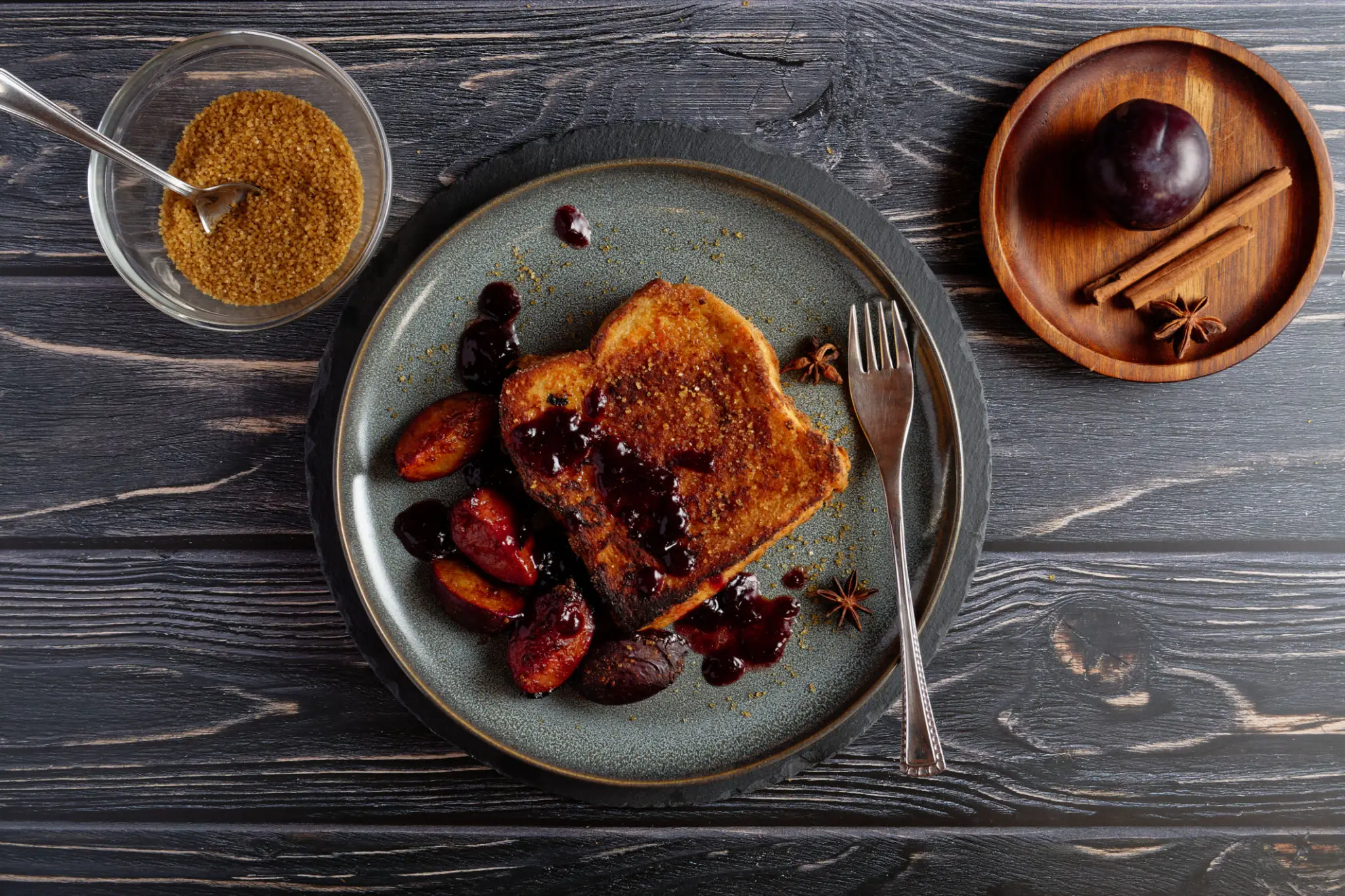 French toast with spiced plum compote and cinnamon